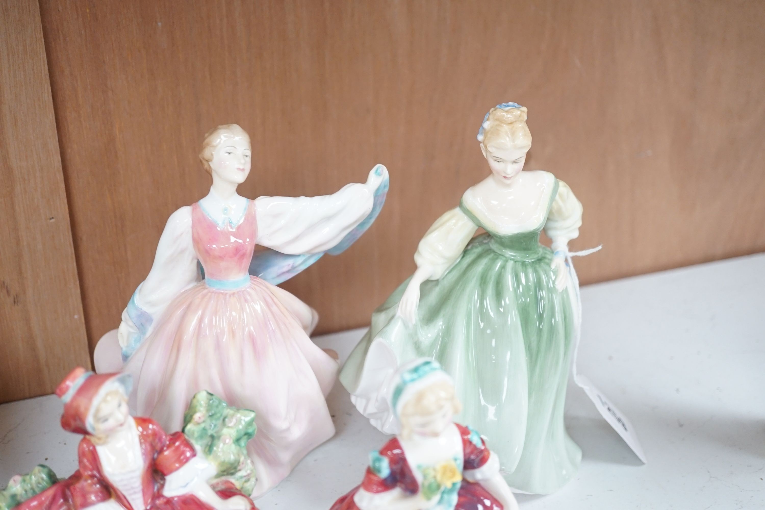 6 Royal Doulton figurines and 3 smaller figurines, Fair Lady HN2193, Gay Morning HN2135, Cissie HN1809, Valerie HN2107, Elegance HN2264, Lydia HN1908, Janet HN1537, Day Dreams HN1731 and Southern Bell HN2229